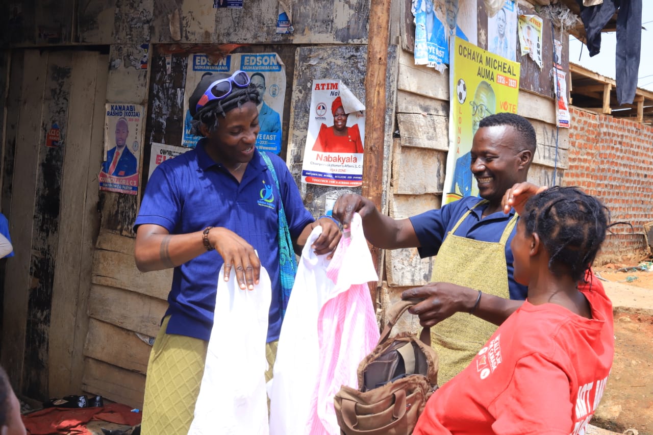 Volunteers sharing food supplies and clothing with vulnerable community members